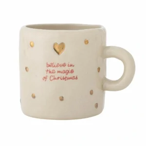 Believe in the magic of Christmas mug on a plain white background